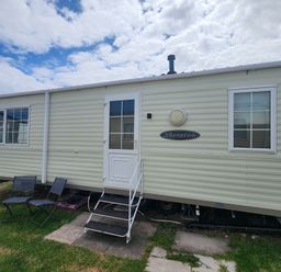 A caravan exterior with windows and steps at Whitley bay parkdean resorts - 52 Beechfield Whitley Bay