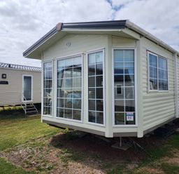 A mobile home with large windows at Whitley bay parkdean resorts - 52 Beechfield Whitley Bay