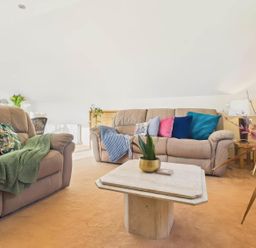 A living room with two sofas and a coffee table at Apartment Sleeps 4 Enclosed Garden Pets Welcome in Flushing