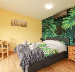 A bedroom with a bed and dining table at The Hyde, Tazamble cottage Launceston