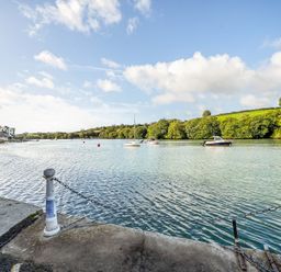 A view of water with boats and trees at Apartment Sleeps 4 with Balcony and Parking in Kingsbridge