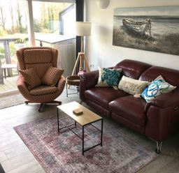 A living room with a sofa and armchair at Torpoint Apartment Sleeps4 Seaside Parking Downderry