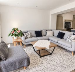 A living room with a sofa and coffee table at Rheidiol St Davids