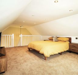 A bedroom with a bed and television at Newly Refurbished Cottage, sleeping 4 and Central Berwick-Upon-Tweed