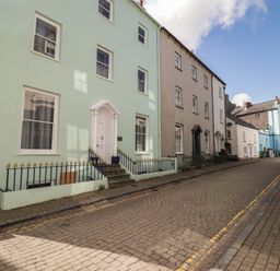 A view of buildings along a street at Flat 5 Tenby