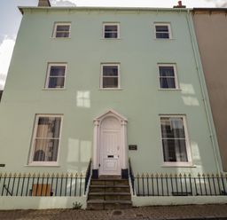 A house with a front door and windows in Tenby