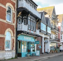A view of storefronts along a street at 1 Embankment House Dartmouth