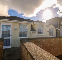 A rooftop area with doors and windows at Llywelyn in Trearddur Bay