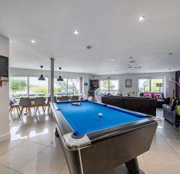 A games room with a pool table and dining area at 5 Bed House, Sleeps 14 with Hot Tub and Bar Tavistock