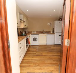 A kitchen with appliances and countertop at The Old Bothy Bolton Low Houses near Wigton