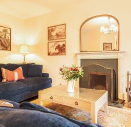 A living room with a sofa and coffee table at Jubilee at the Graythwaite Estate in Graythwaite near Hawkshead