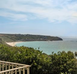 A coastal view with beach and houses at The Lookout in Sennen
