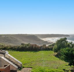 A view of the beach and ocean from a property at Carn Eve Sennen Cove near St Just
