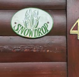 A sign with the name Snowdrop and number 4 at Snowdrop in Saltburn-by-the-Sea