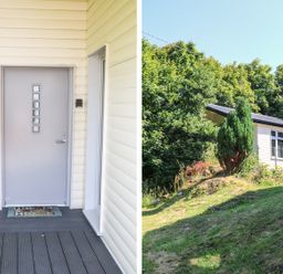 A front door entrance with a welcome mat and a side view of a white house surrounded by trees and greenery at Hidden Gem Cabin in Lettermacaward near Dungloe County Donegal