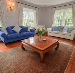 A living room with sofas and a coffee table at Little Ellers in Portinscale near Keswick