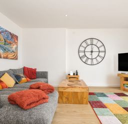 A living room with a sofa and a coffee table at The View in Newquay