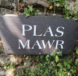A sign reading Plas Mawr at Plas Mawr in Groeslon