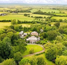 A house surrounded by gardens and fields at Parnacott in Holsworthy