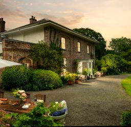 A house with garden furniture and plants at Parnacott in Holsworthy