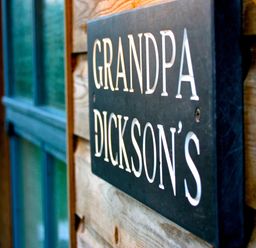 A sign with the name Grandpa Dickson's at Little Petherick