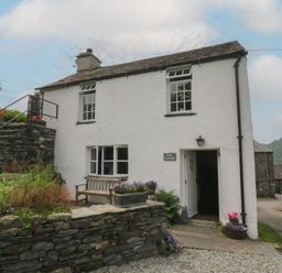 A house exterior with garden at Rose Cottage Broughton-In-Furness