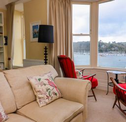 A living room with a view of the marina at 3 Dartview, Dartmouth