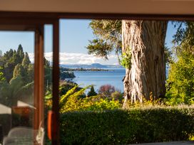 A view of the lake and trees at Ruatotara - Pukawa Holiday Home Pukawa Bay