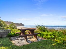 A picnic table near the beach at Beach Galore - Waihi Beach