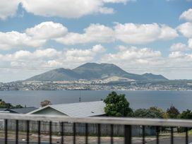 A view of a mountain and lake in the background at Acacia View at No. 3 - Acacia Bay