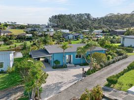 A house in a landscaped area at Little Pearl of Vista Verano - Mangawhai Village