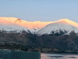 Mountains with snow at Lakeside Escape - Wanaka Holiday Bach Wanaka