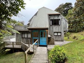 A house with a deck and garden at Moetapu Bay Bliss - Marlborough Sounds Retreat Moetapu Bay