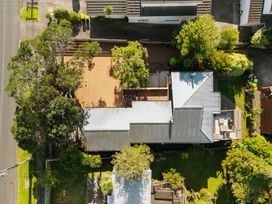 An aerial view of a house and surrounding yard at Waiake Family Retreat - Auckland