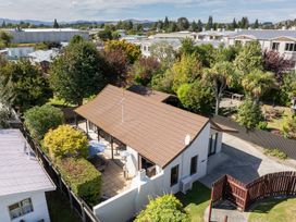 An aerial view of a house with a garden at Te anau holiday home Te Anau