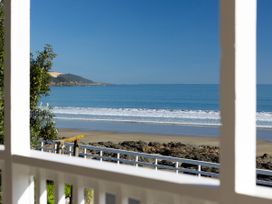 A view of the ocean and beach from a property at Ahipara in Kaitaia