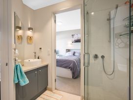 A bathroom with a shower and sink at Wellington Holiday in Wellington