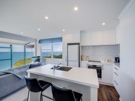 A kitchen with a sea view at Cape View - Napier Holiday Home Bluff Hill