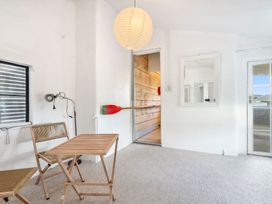 A room with a table and chairs at Wellington Holiday home in Wellington