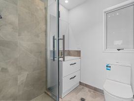 A bathroom with a shower and vanity at Hamilton in Hamilton