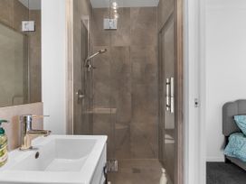 A bathroom with a shower and sink at Hamilton in Hamilton