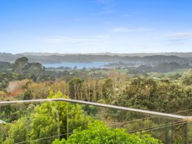 A view of hills and a lake at Raglan Holiday Home in Raglan