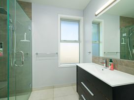 A bathroom with a sink and shower at Kaikoura