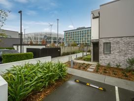 An outdoor area with plants and buildings at Townheart on Hereford - Christchurch City Apartment