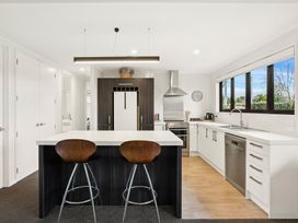 A kitchen with counter and appliances at Vista Haven - Bannockburn