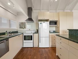 A kitchen with appliances and cabinets at Rotorua