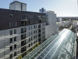 A view of buildings and a glass structure at Downtown Haven - Christchurch Holiday Apartment Christchurch