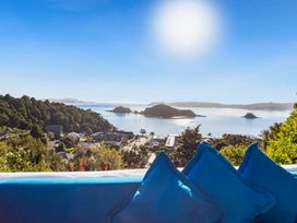 A view of the sea and islands from a terrace at Paihia Holiday Home in Paihia