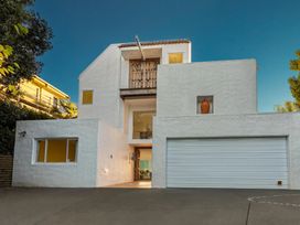 A house with garage and windows at Paihia Holiday Home in Paihia