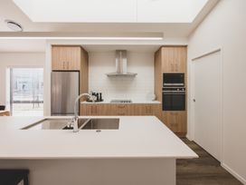 A kitchen with appliances and cabinets at 